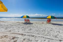 Sunshine At The Beach"- Now 3 Bedrooms! Many Upgrades! Perfect Location!
